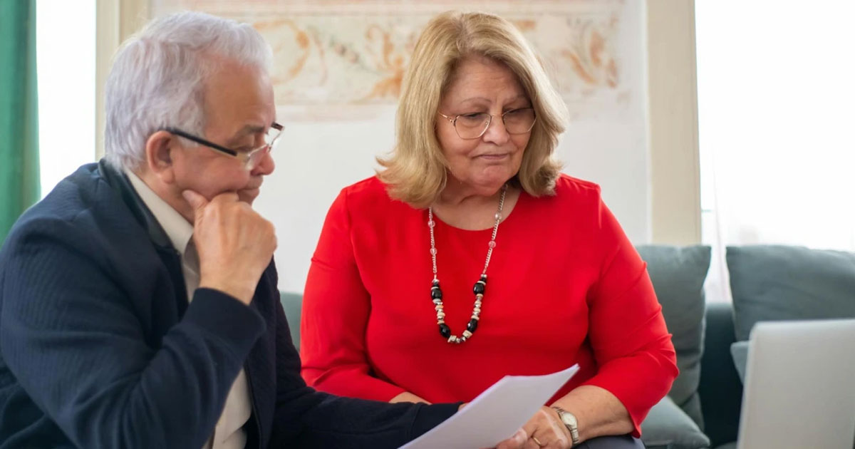 A photo of two person having a conversation about financial advice QLD.